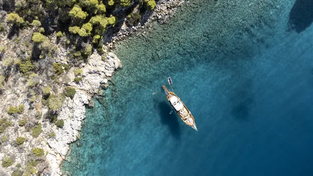 Aerial view of AXION ESTI beside a rocky coast