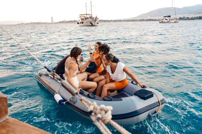 Guests aboard AXION ESTI during a private cruise from Athens